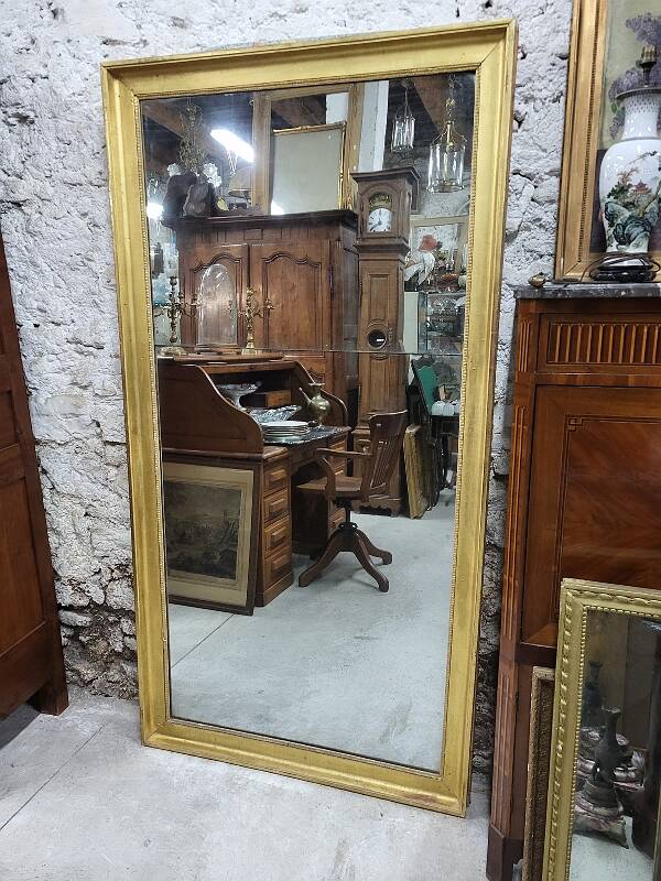 Large gilt mirror in 2 parts from the early 19th century