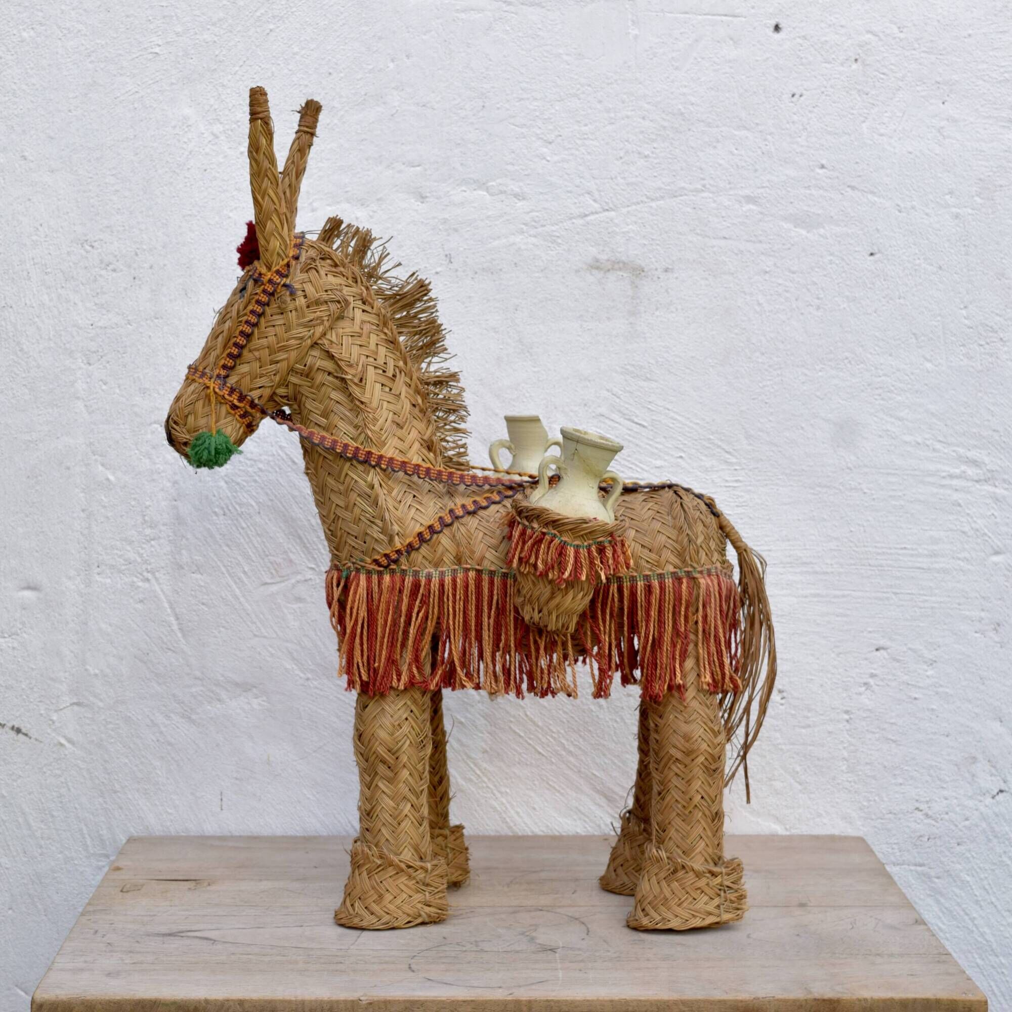 Spanish decorative donkey in raffia carrying two jars - 62 cm high - 1950