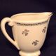 Antique milk jug in Gien earthenware, Valence model A040.