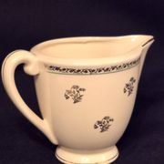 Antique milk jug in Gien earthenware, Valence model A040.