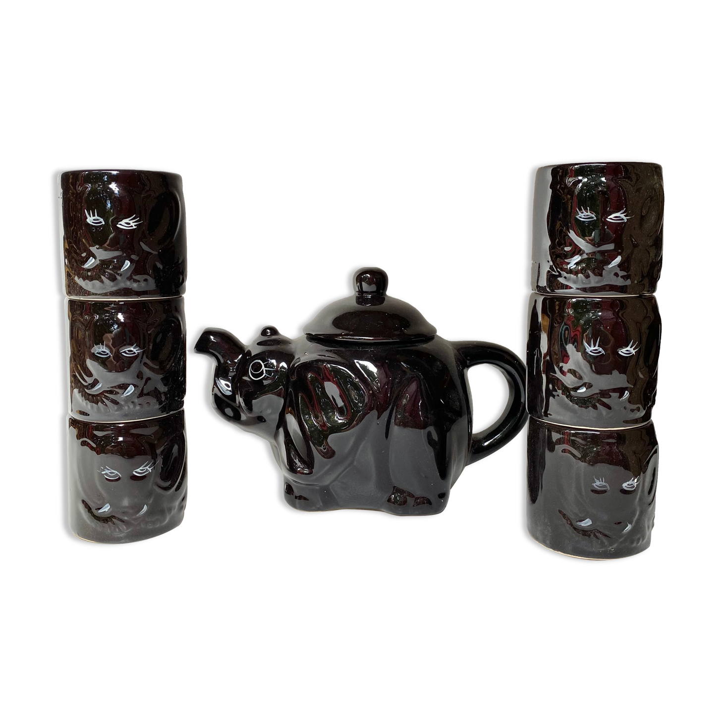 Vintage teapot and vintage elephant cups