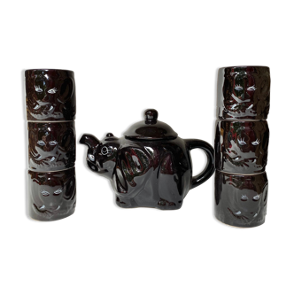 Vintage teapot and vintage elephant cups