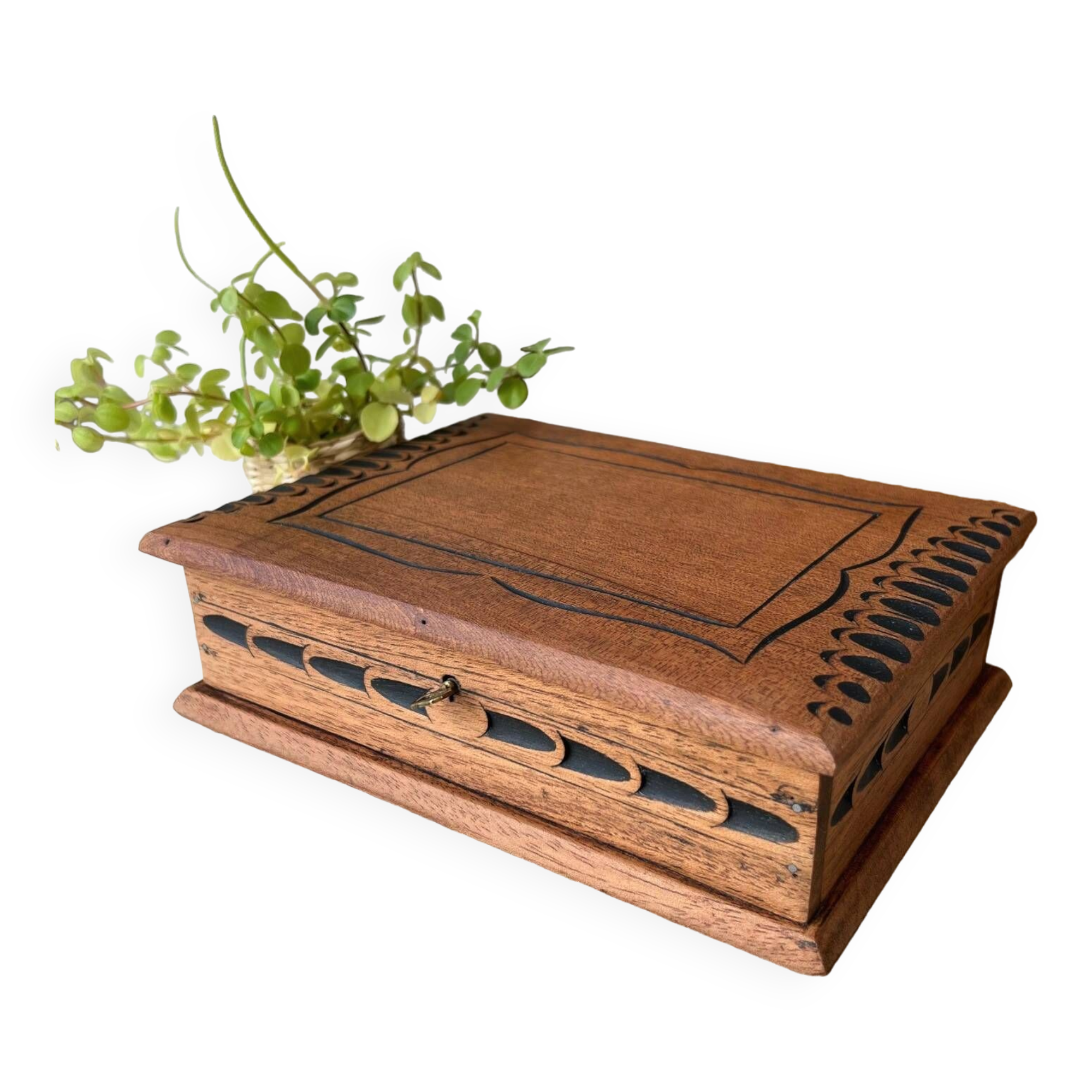 Carved wooden box with key