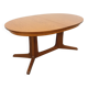 Vintage oval dining table Baumann from the 60s and 70s in teak with extension.