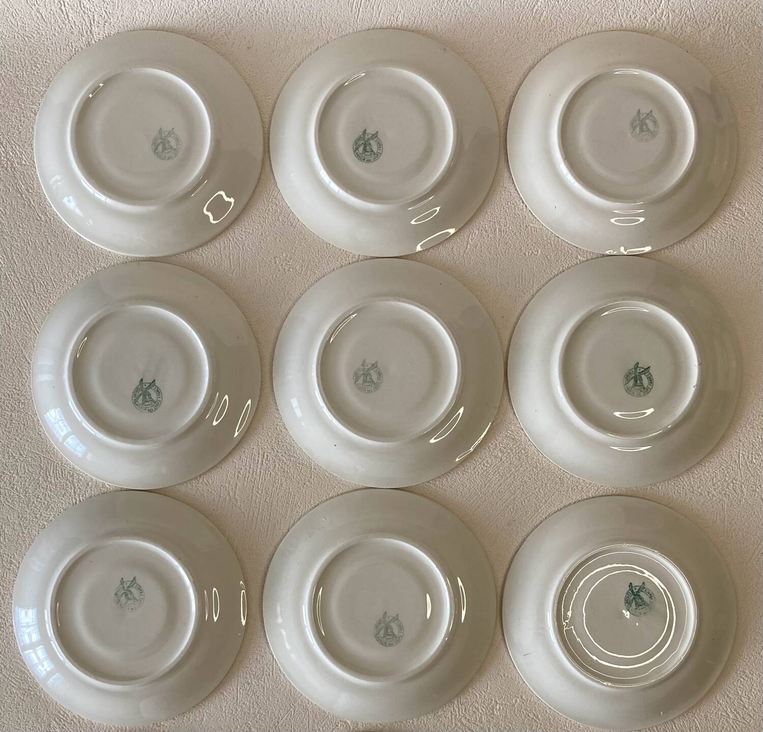 Yellow and white cups and saucers with gold trim Moulin des loups