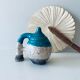 Poterie en terre cuite émaillée bleu et crème