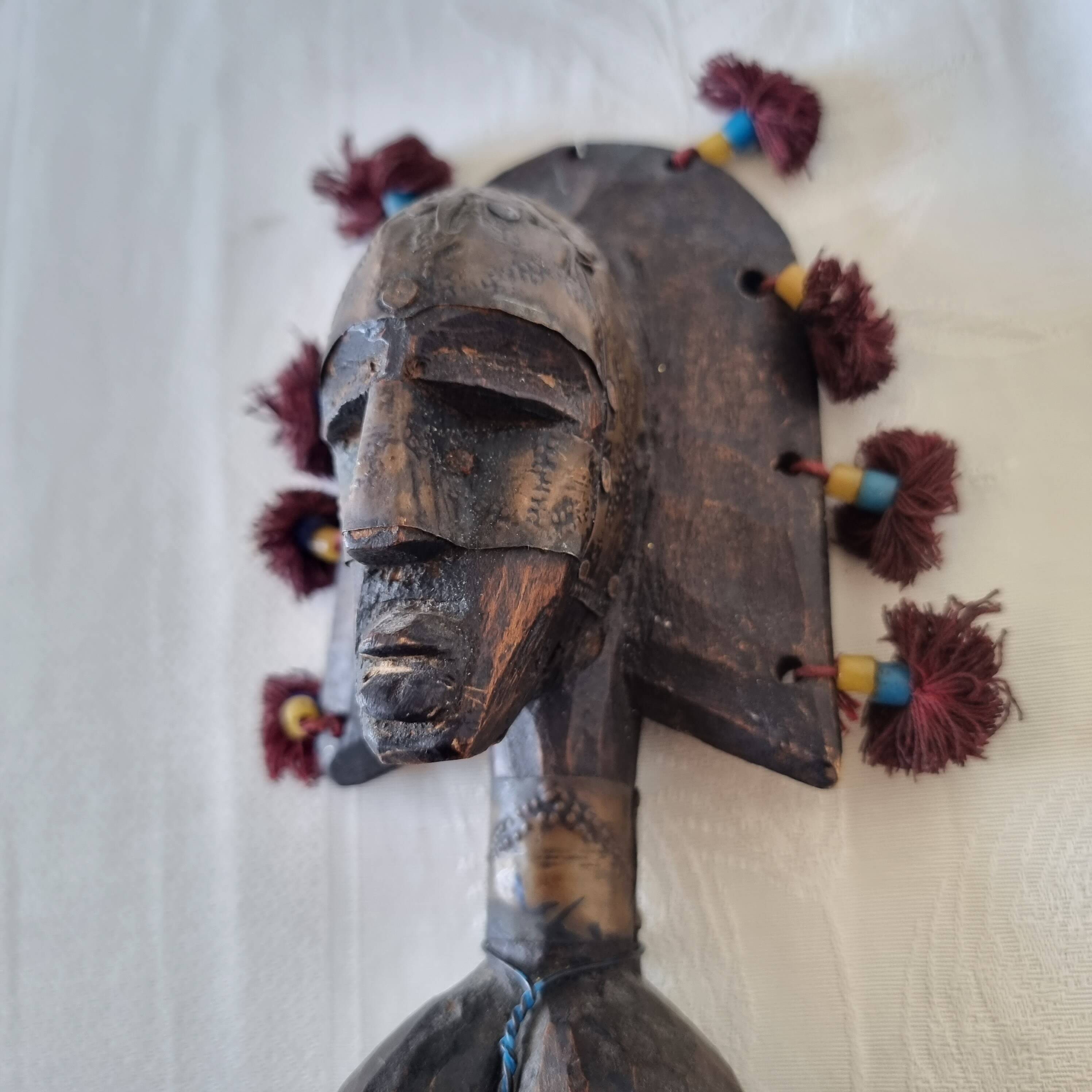 Scepter decorated with a female figure in wood and brass