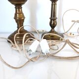 Deux pieds de lampes bougeoir et pique cierge anciens