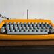 Orange consul typewriter 1970s