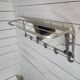 Aluminum wall coat rack with pivoting mirror from the 60s