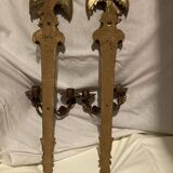 Pair of candle holders in wall, eagle pattern in gilded wood and brass