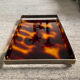 Vintage plateau in tortoiseshell lucite, Maison Mercier style.