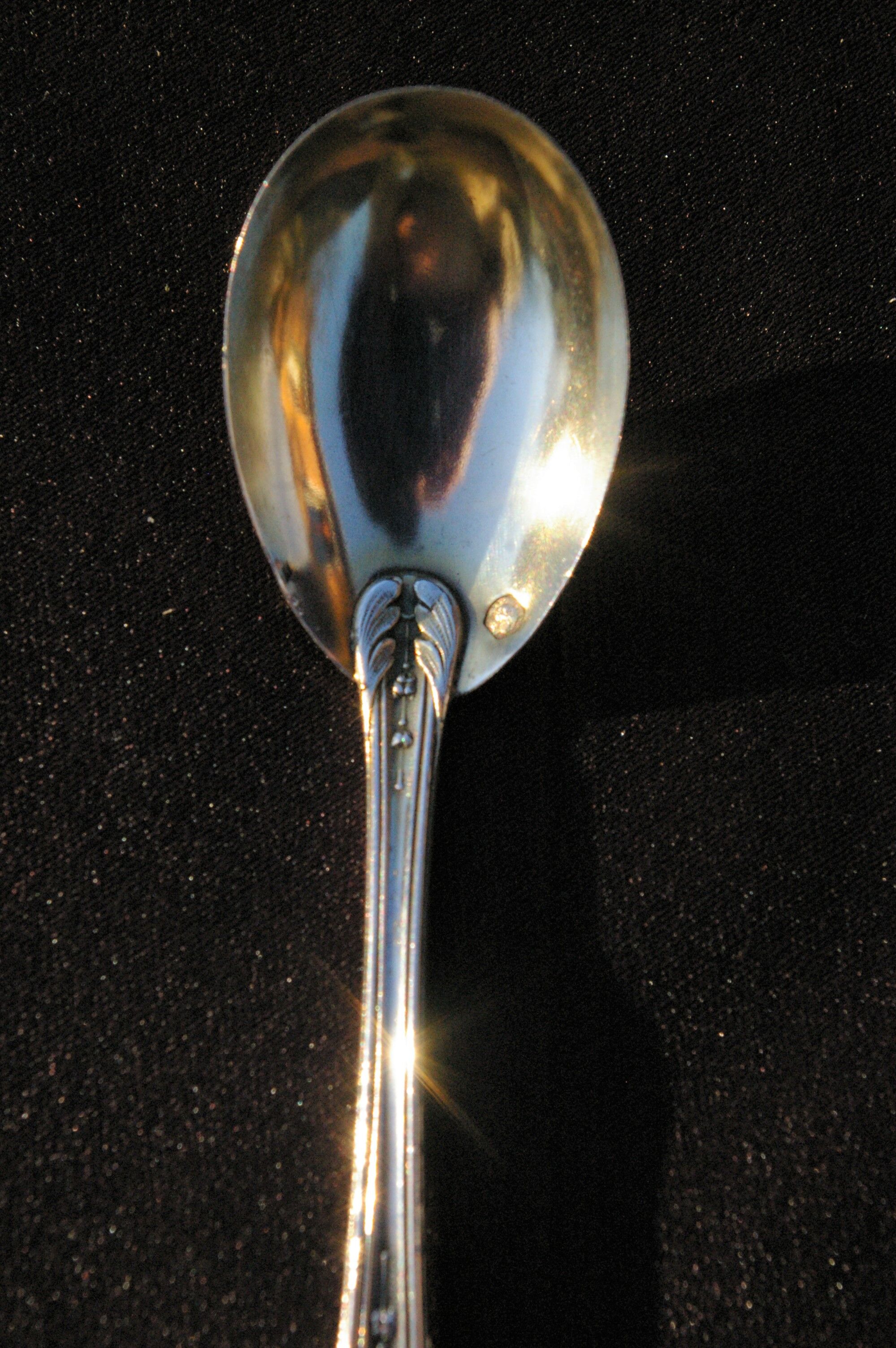 Egg spoon in solid silver and vermeil