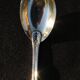 Egg spoon in solid silver and vermeil