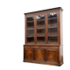Large glass-fronted library in rosewood from the 19th century.