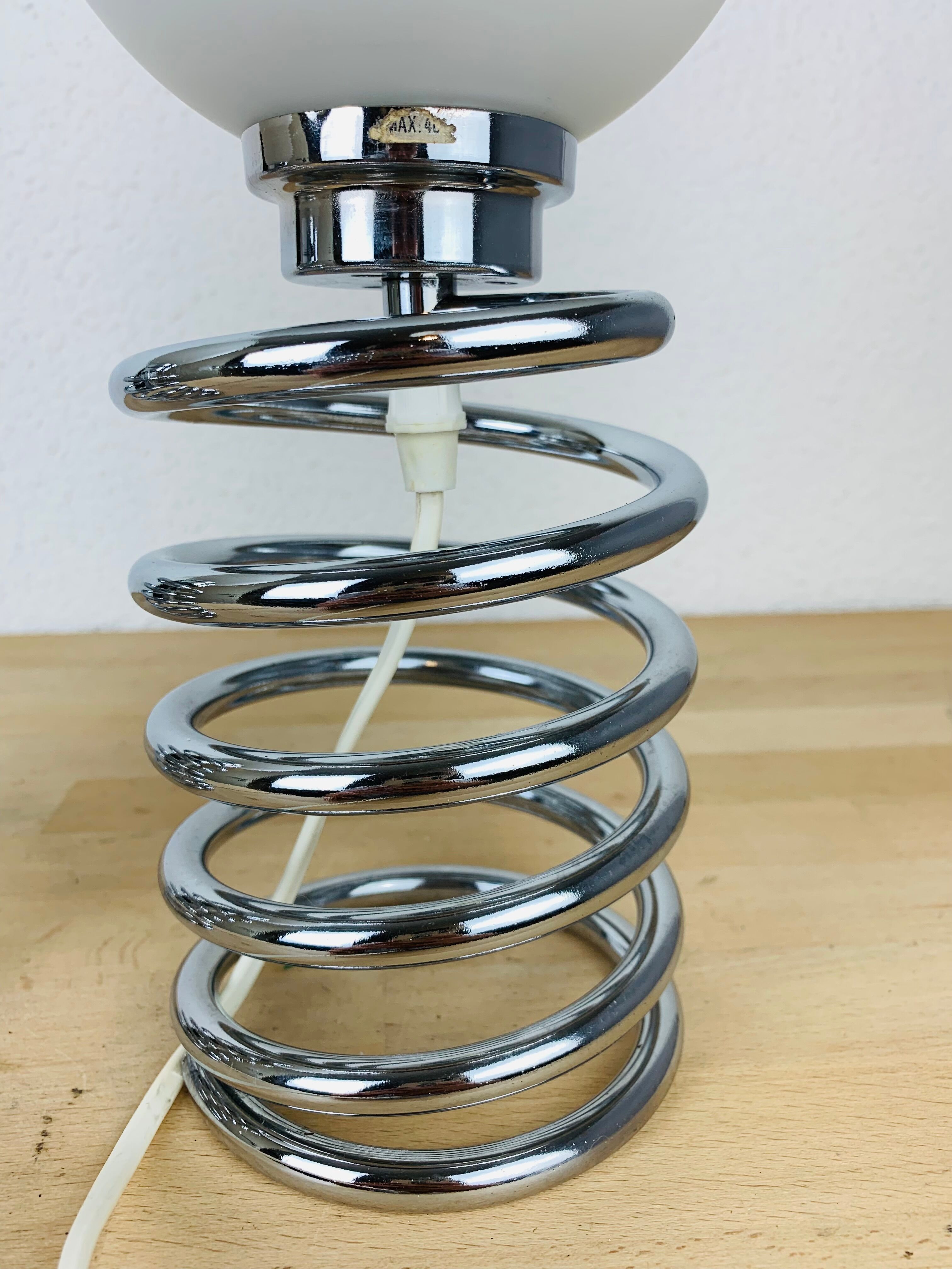 Pair of lamps spring chrome 70s