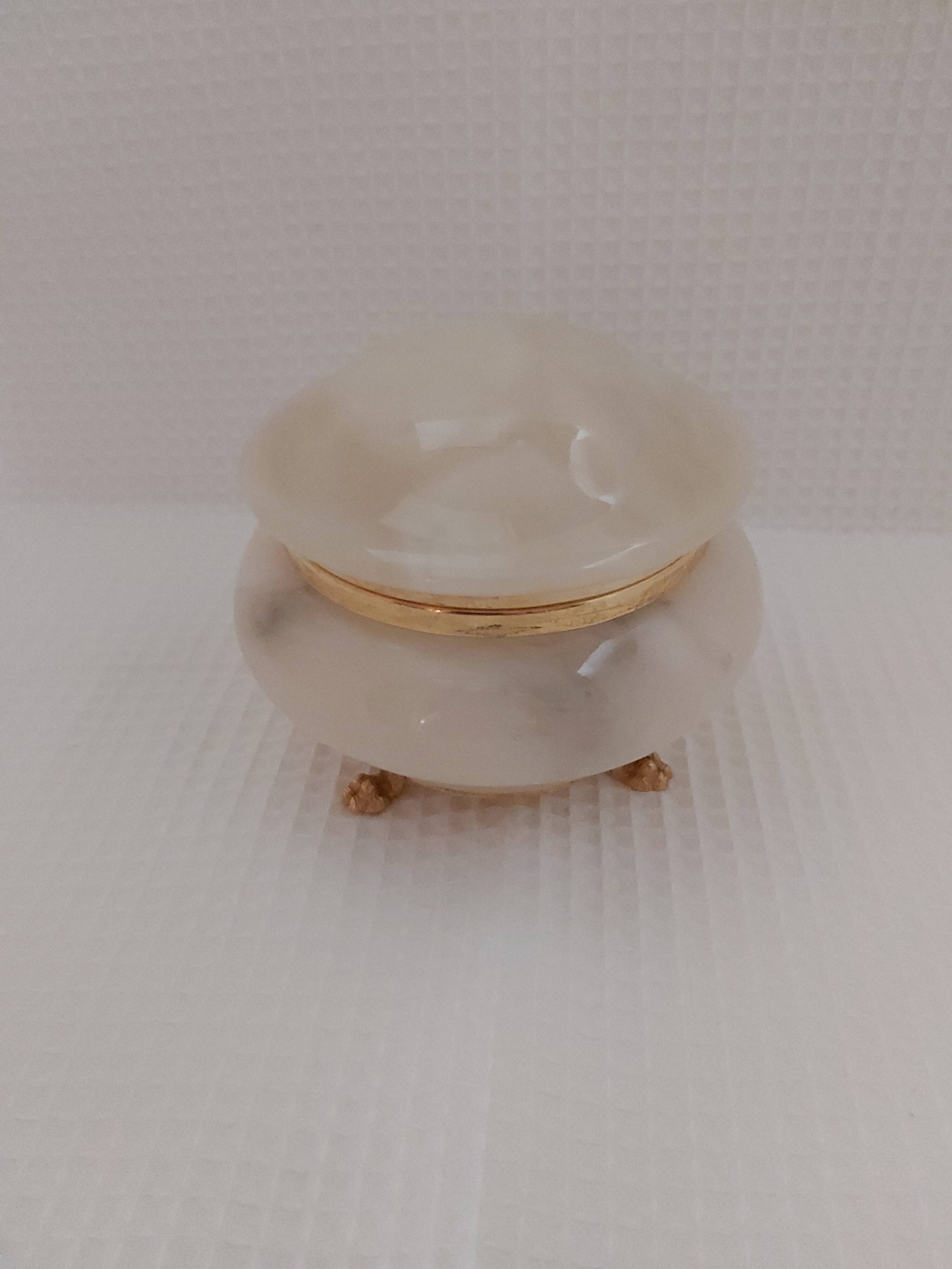 Ivory-colored alabaster box on feet