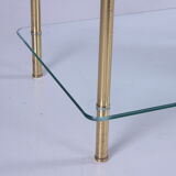 Hollywood Regency side table with gold-colored legs