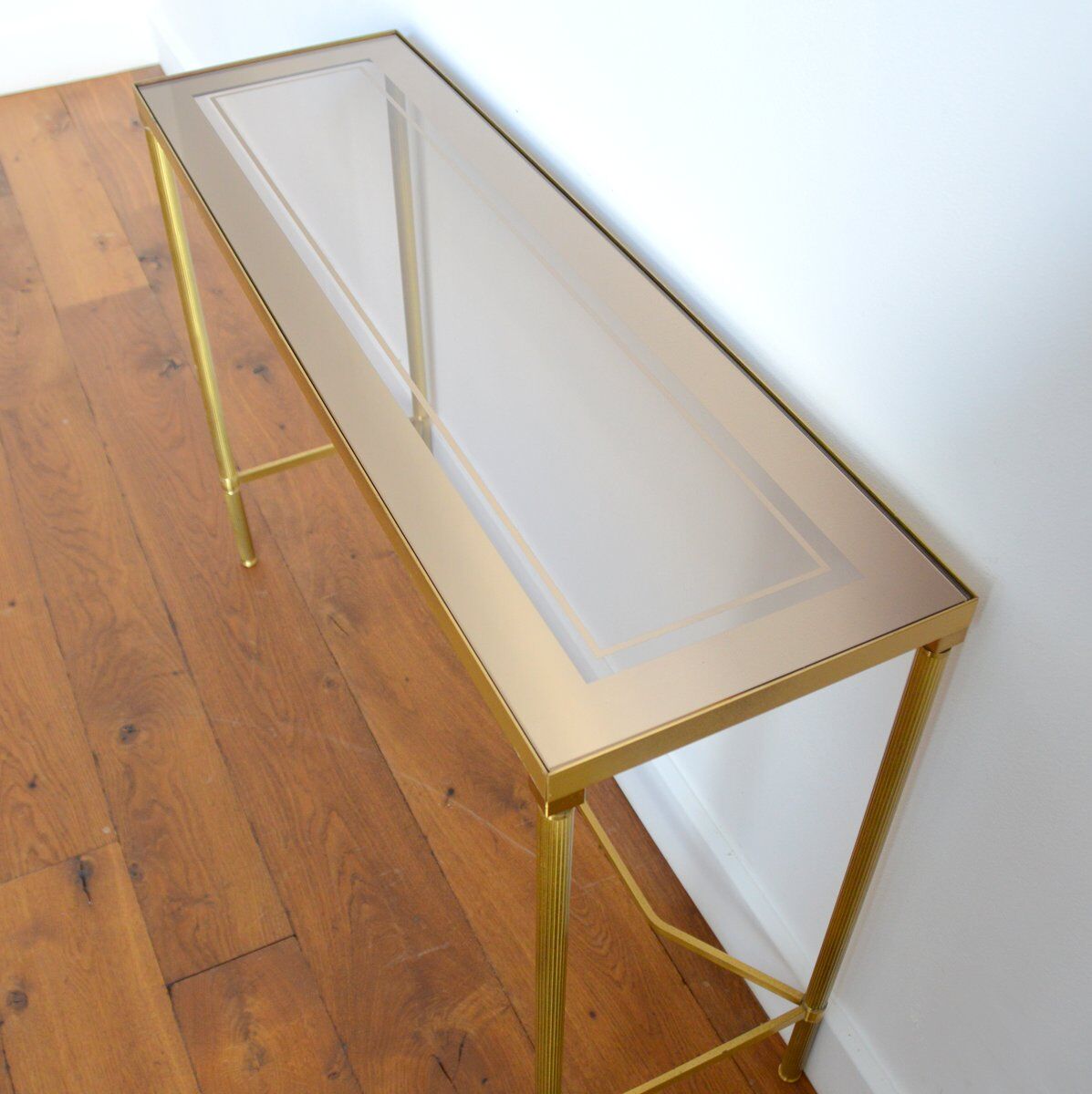 Gilded console and glass 1970s