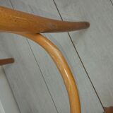 Stunt and curved wood bar stool