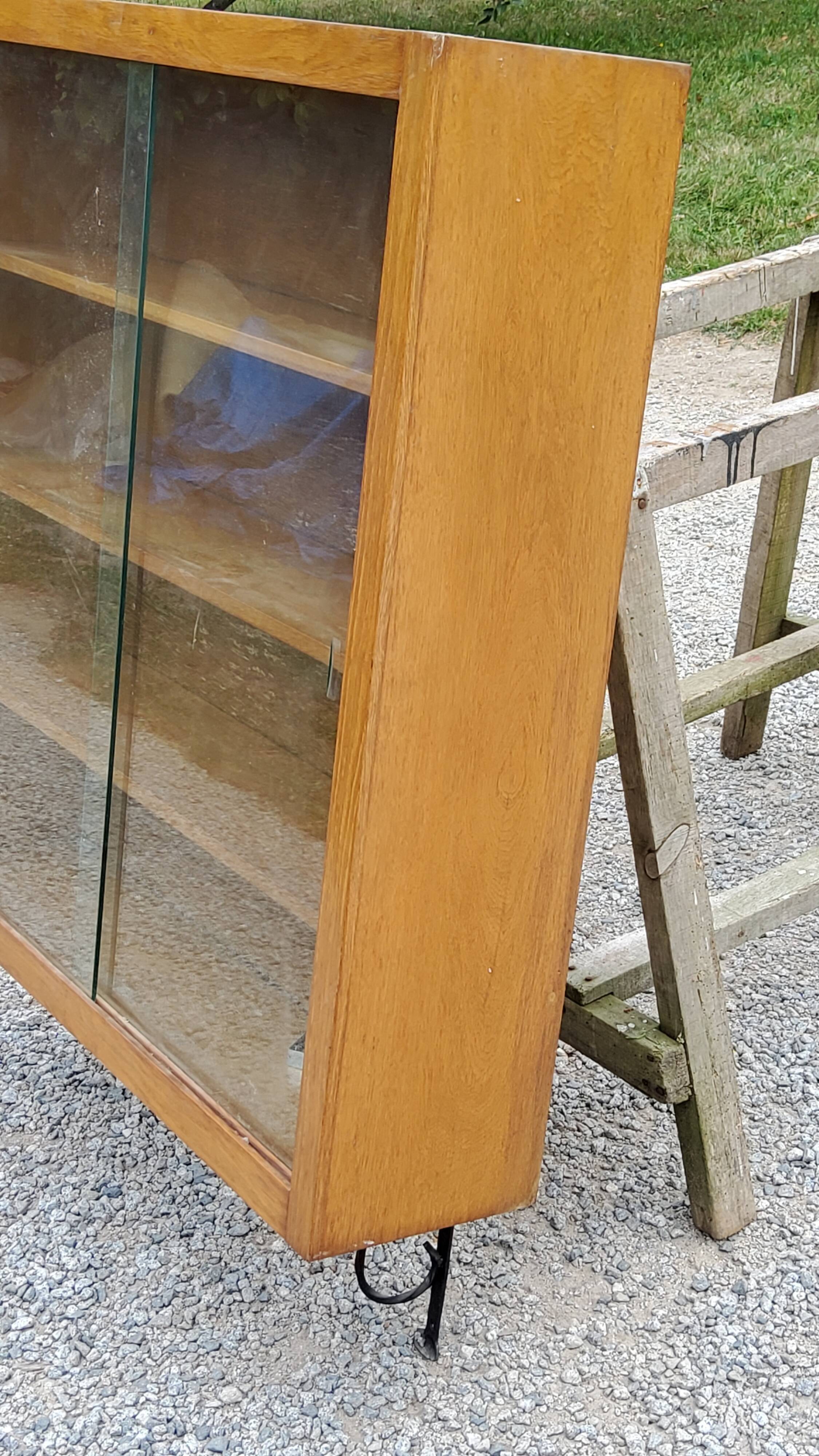Wall display case from the 50s in solid blond oak