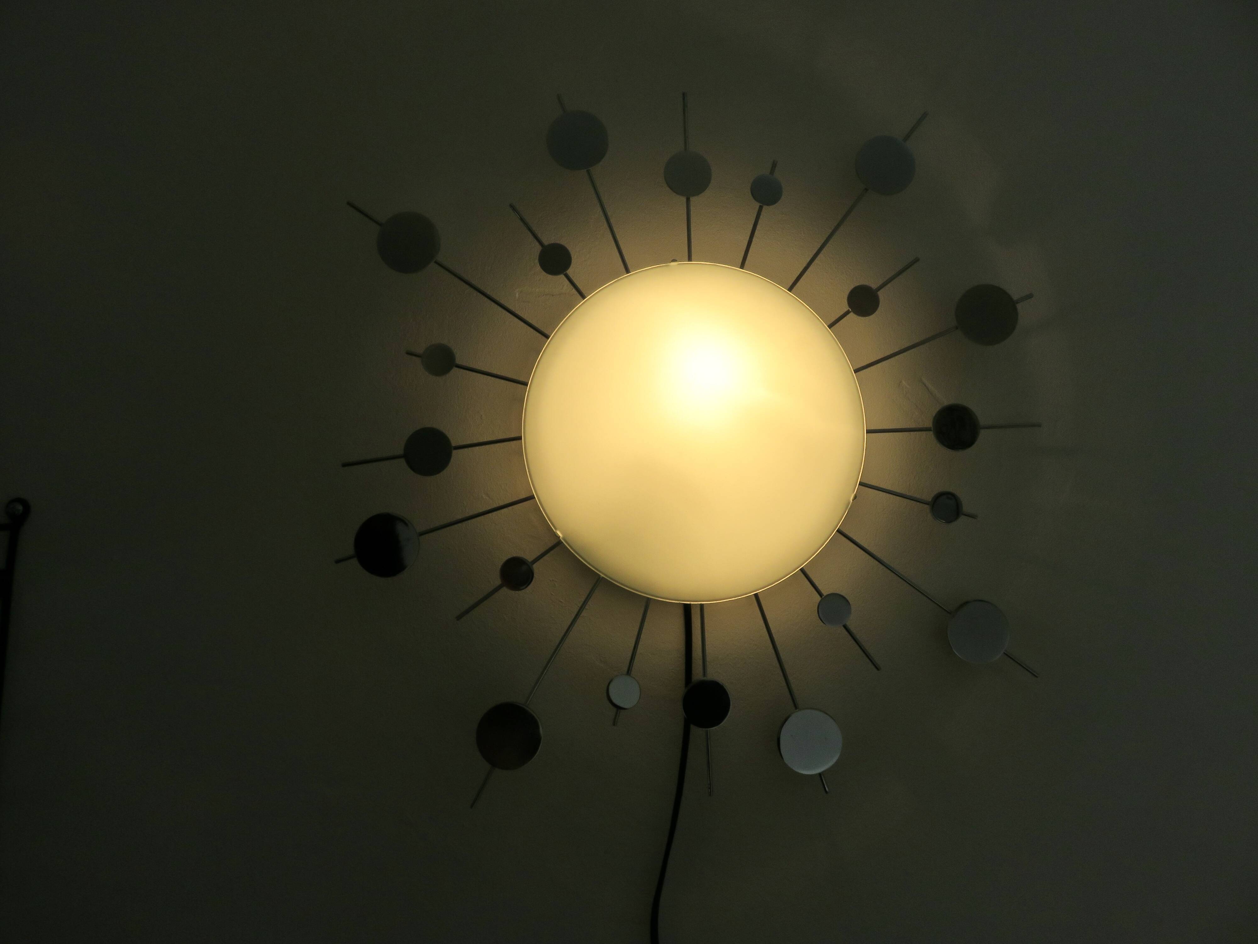 "Sun" wall lamp in chrome metal and frosted glass 80s 90s