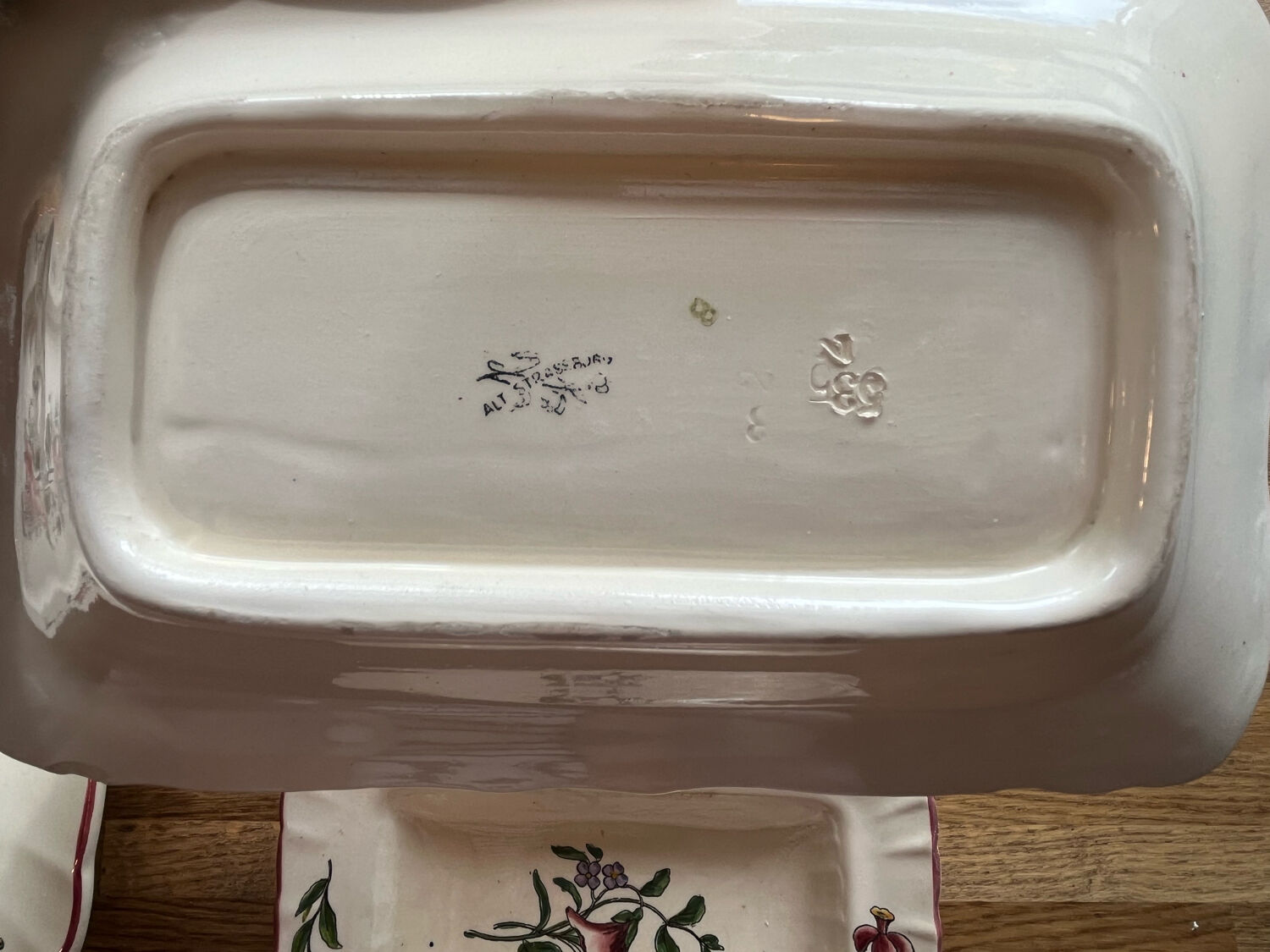 Old dishes in earthenware floral motif