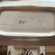 Old dishes in earthenware floral motif