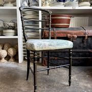 Napoleon III chair in blackened wood and green toile de Jouy.