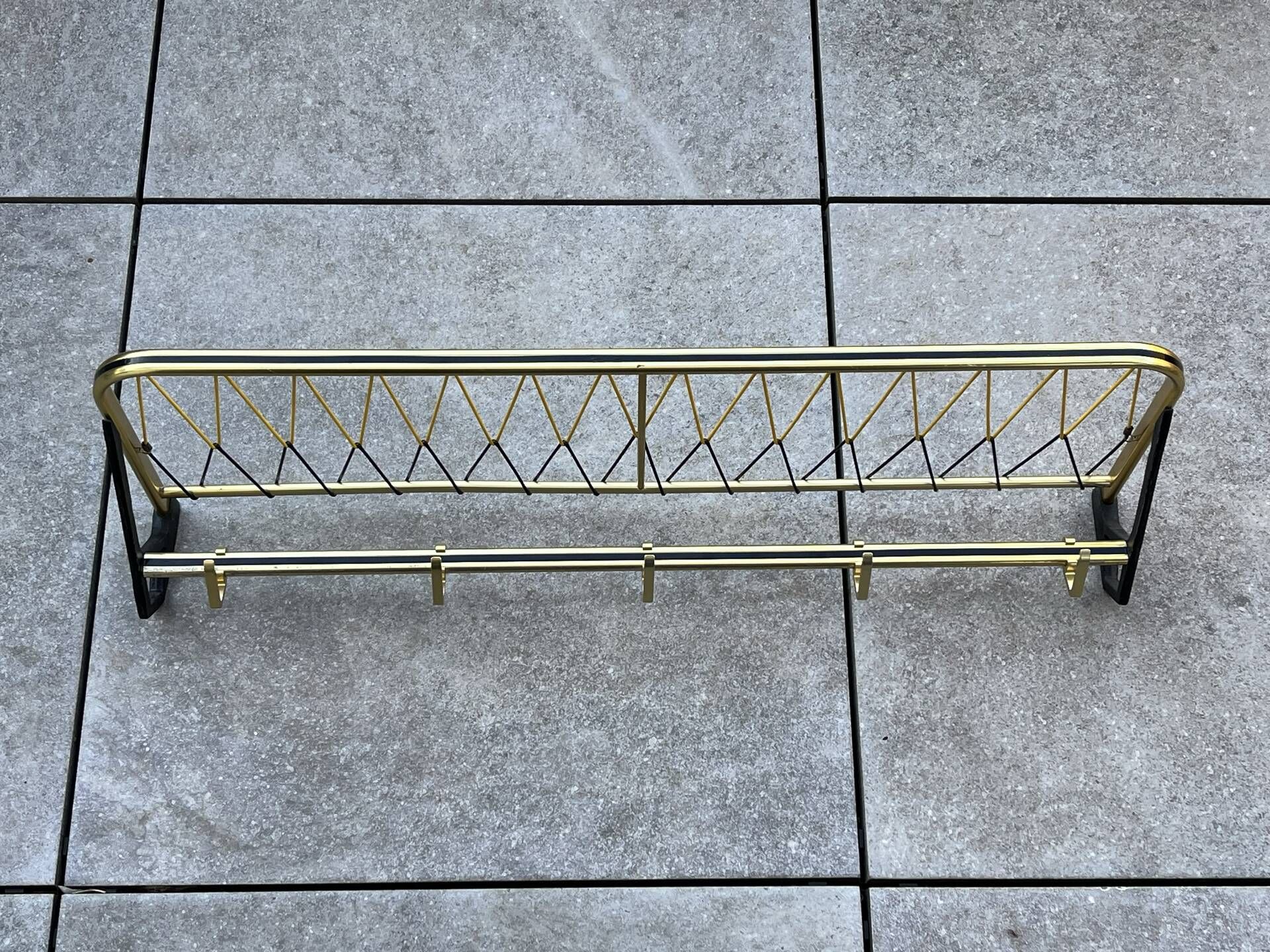 Coat rack in the style of a train luggage rack, length = 79 cm.