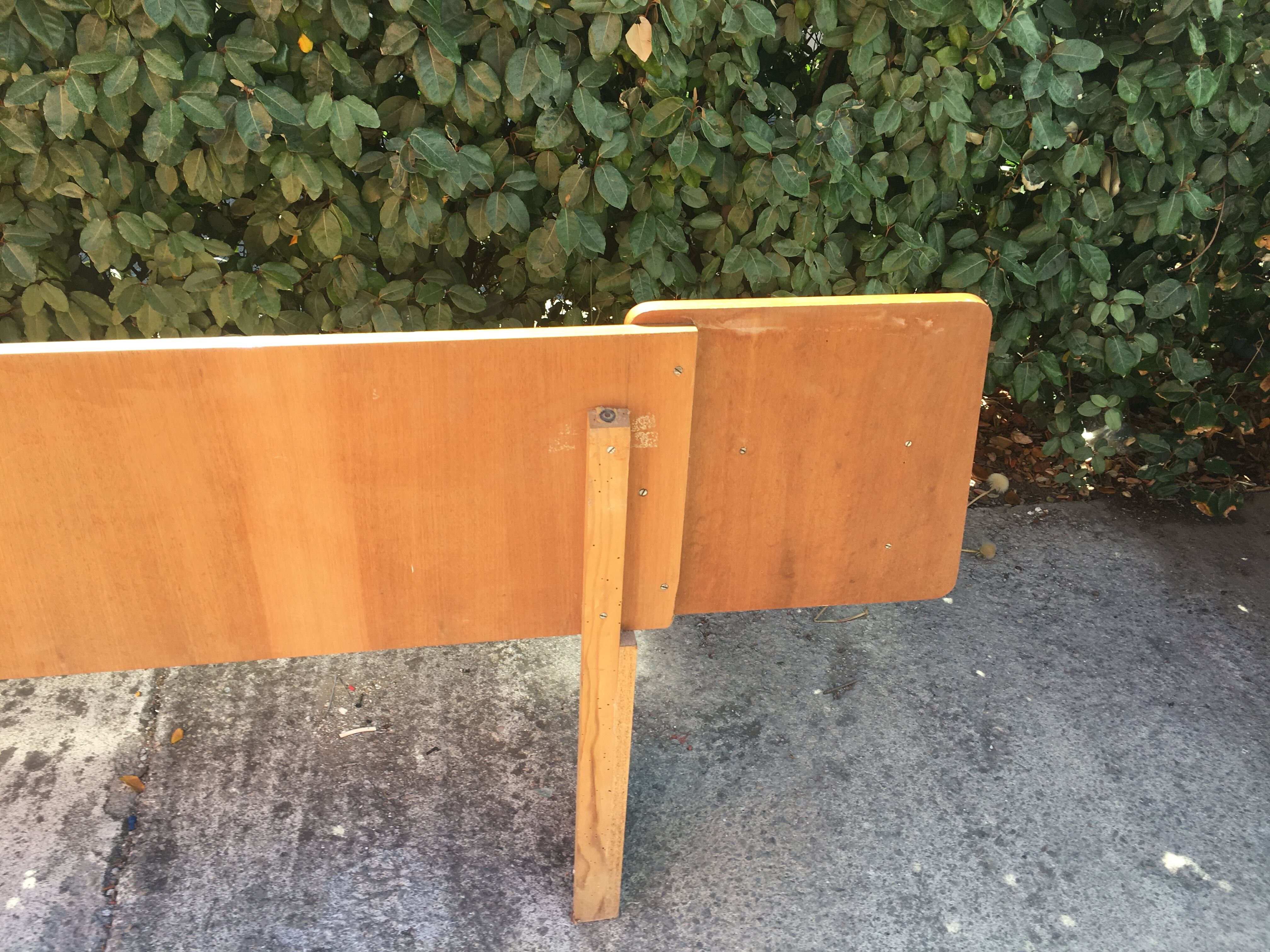 Vintage headboard with hanging bedside tables