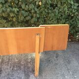 Vintage headboard with hanging bedside tables