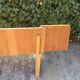 Vintage headboard with hanging bedside tables