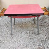 Table with two stools in red formica