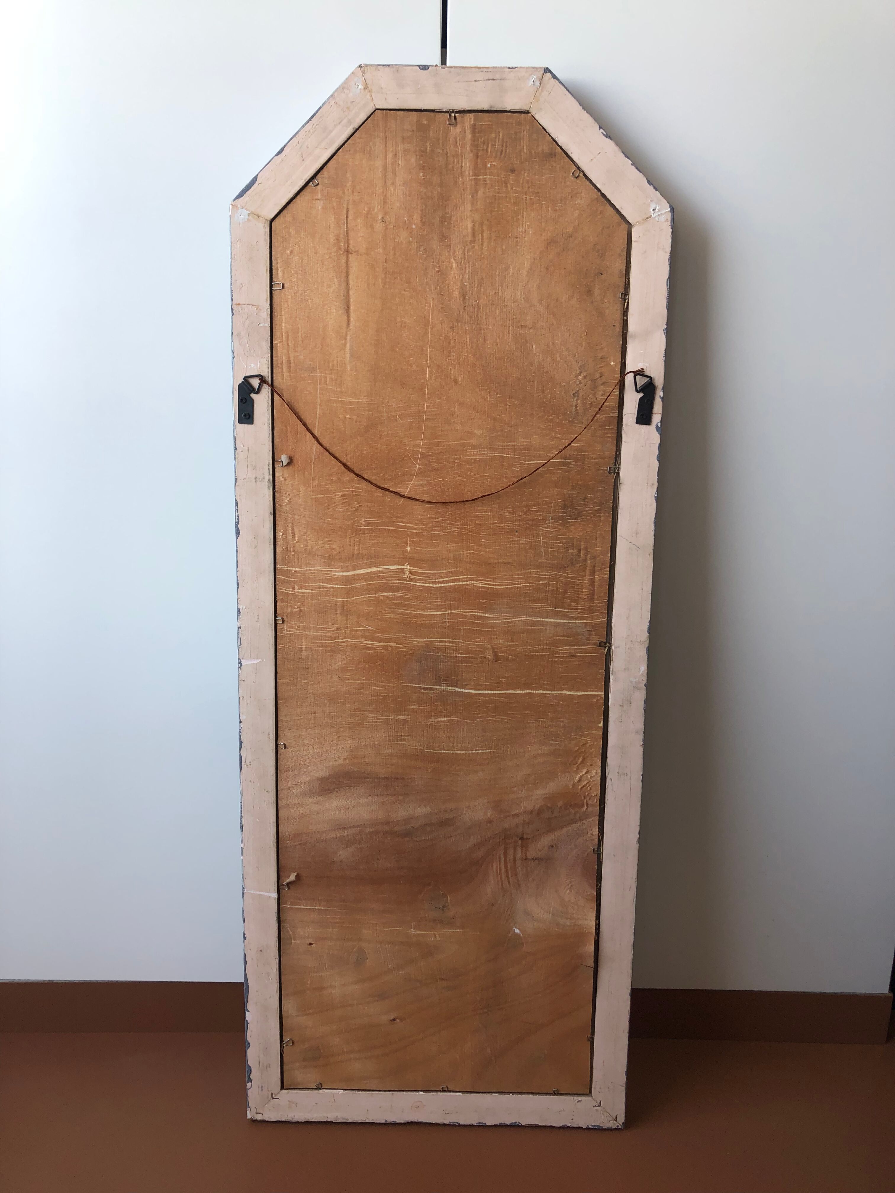 Old patinated mirror golden gray