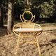 Vintage rattan hairdresser, 1960s, round mirror and woven backrest.