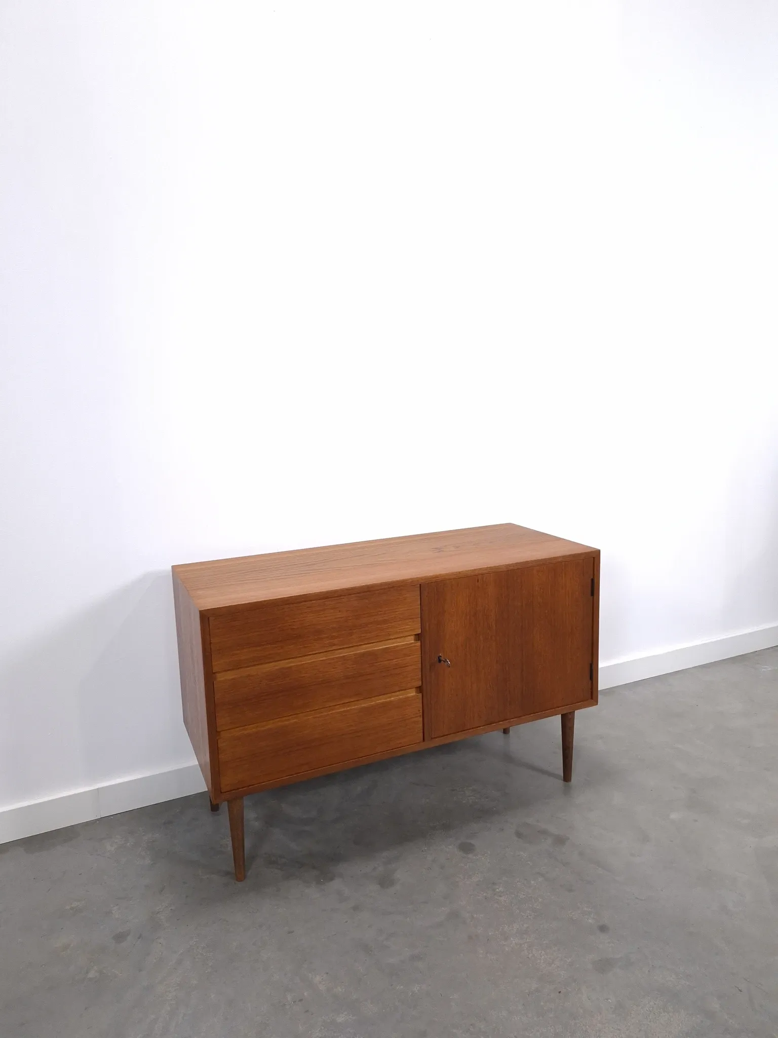 Vintage teak cabinet from the 1960s, sideboard with 3 drawers and a door.