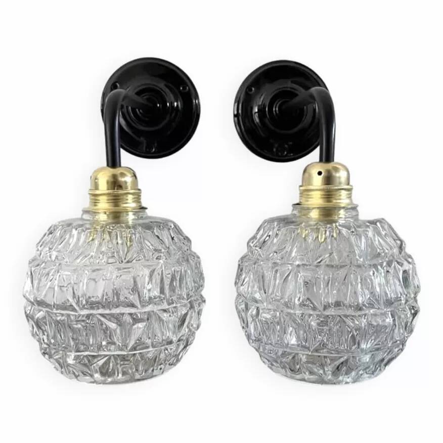 Pair of chiseled glass wall sconces
