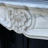 Louis XV style fireplace in white Carrara marble arabescato