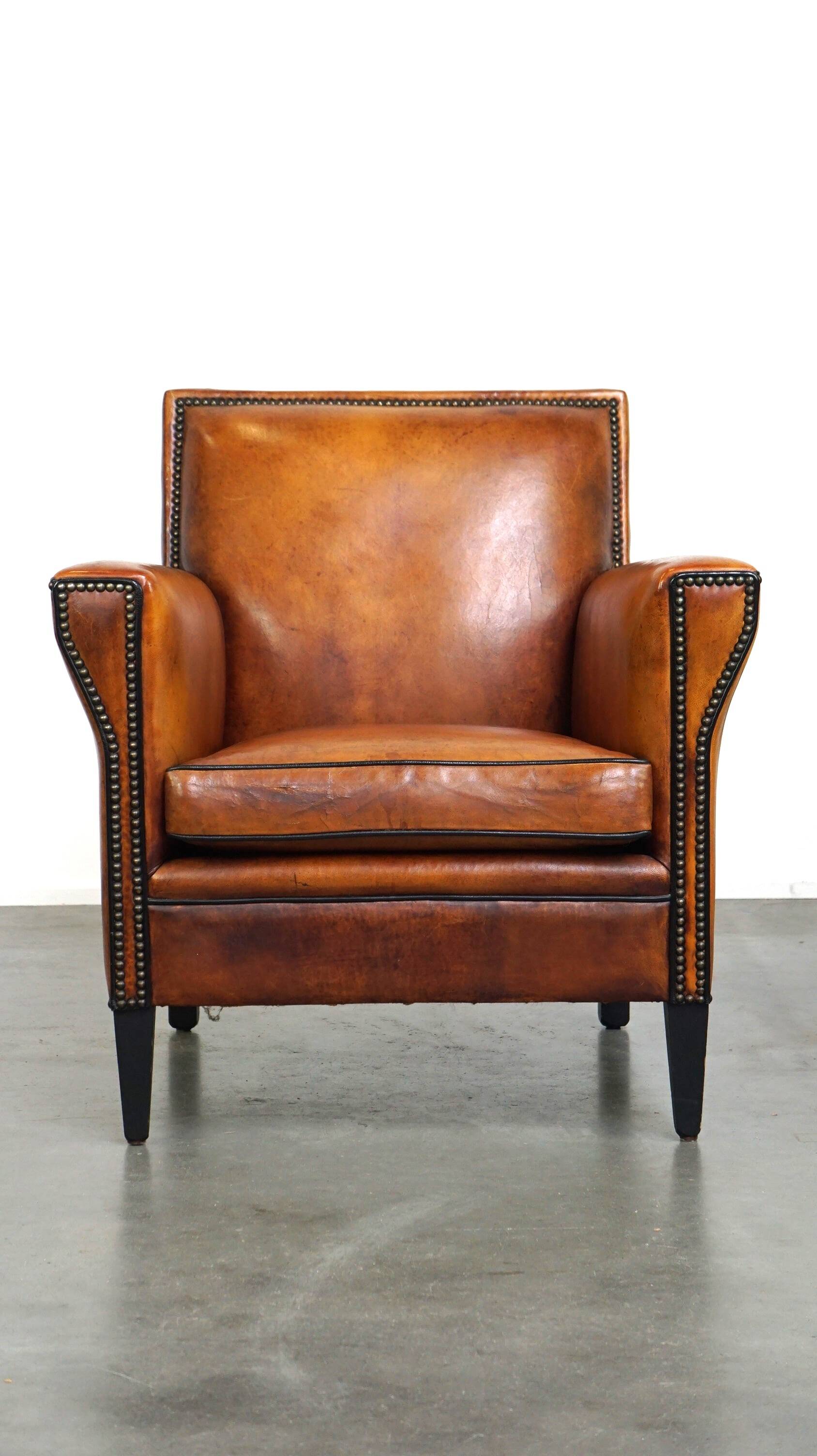 Sleek sheepskin Art Deco design armchair with beautiful details