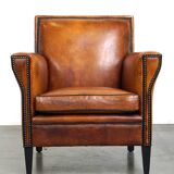 Sleek sheepskin Art Deco design armchair with beautiful details