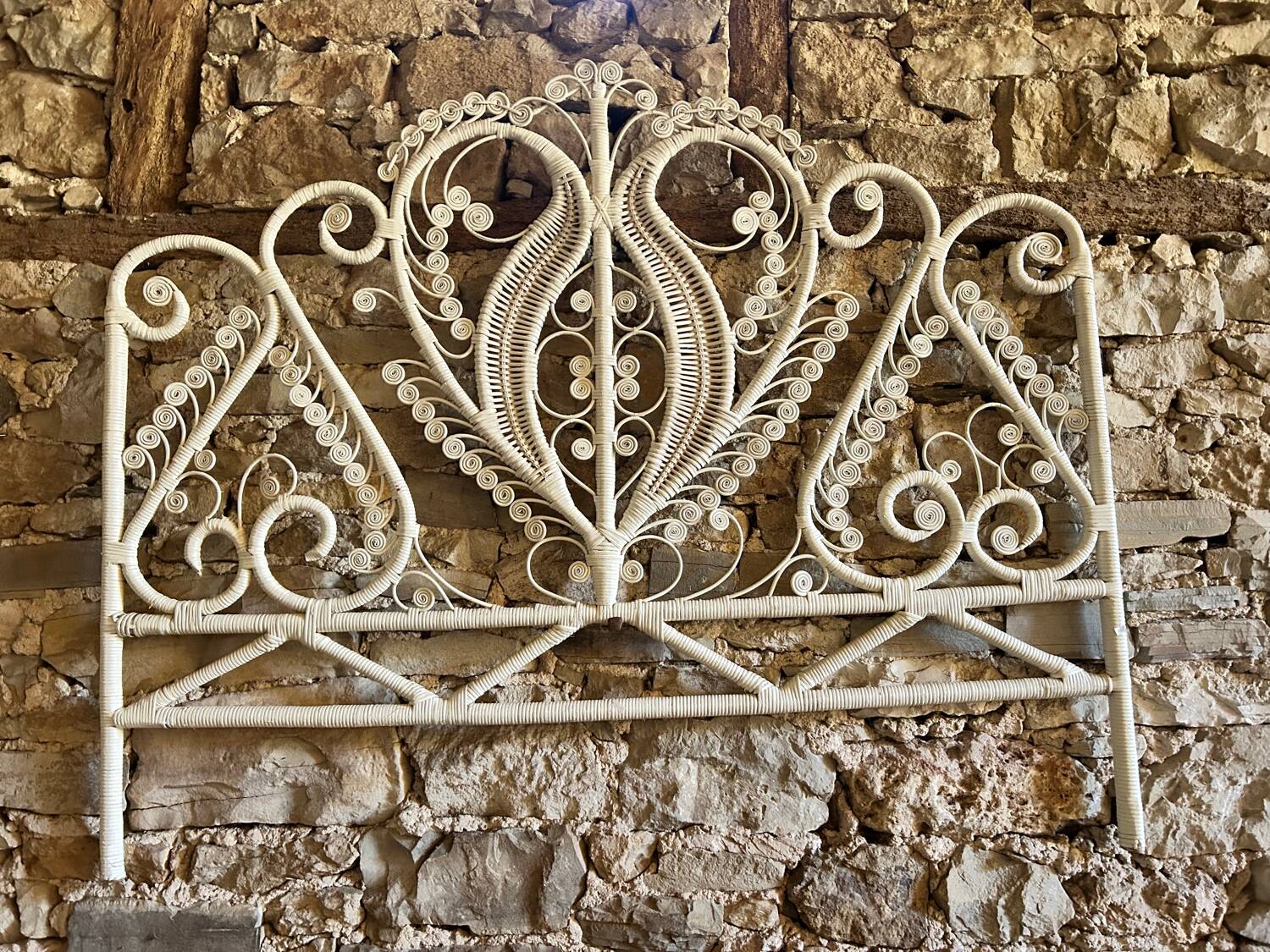 Peacock style white rattan headboard