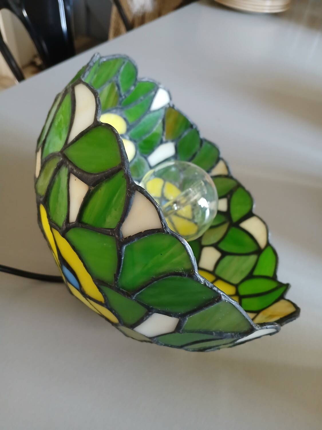 Antique stained glass and tin pendant light