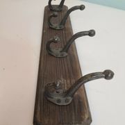 Wooden school coat rack with cast iron hooks
