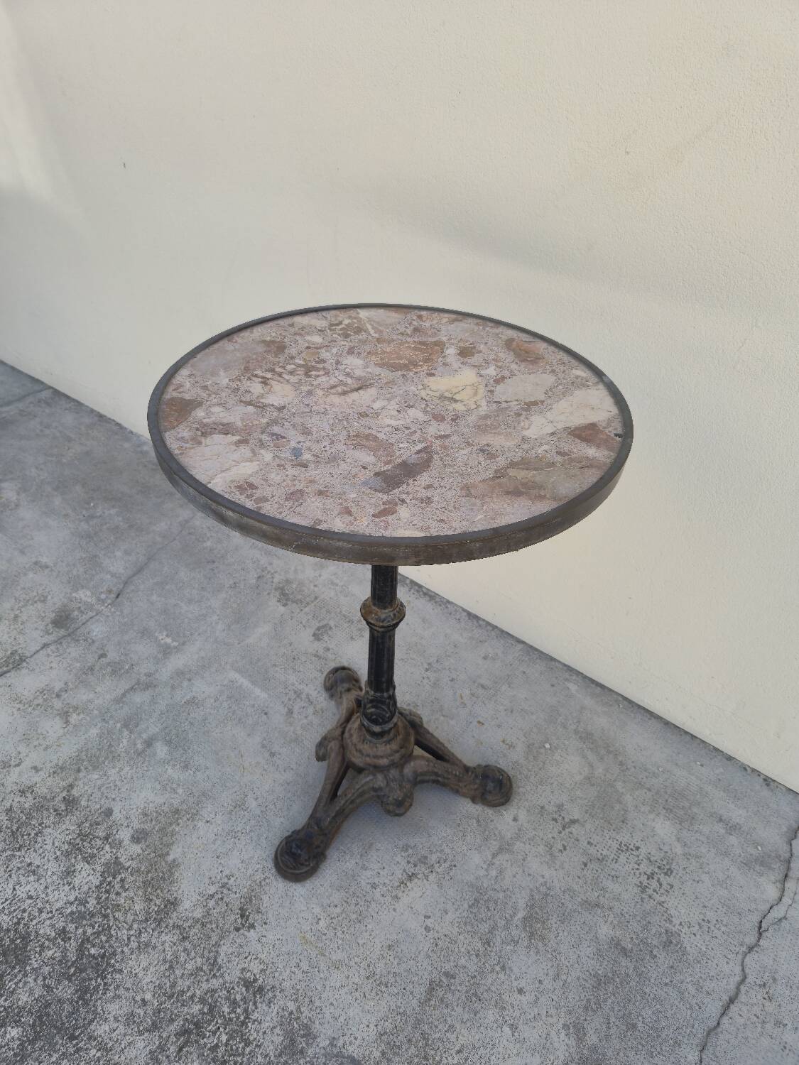 Pedestal table for restaurant bistro with lion paws and marble