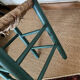 Vintage stool in green patinated wood and straw