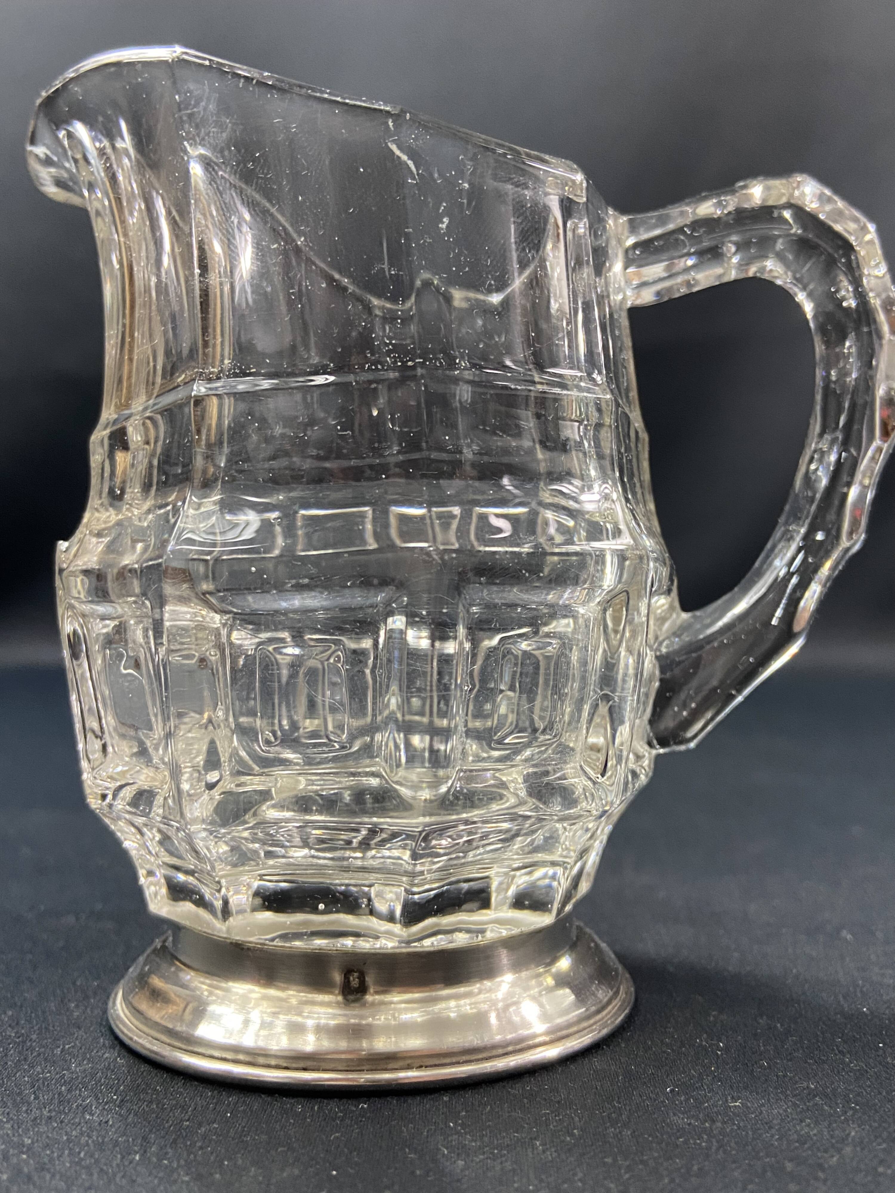 Glass milk jug on solid silver mount, Minerva 1st title