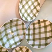 Set of six flat plates and one Moulin des Loups bowl, green tablecloth model/1950s-1960s
