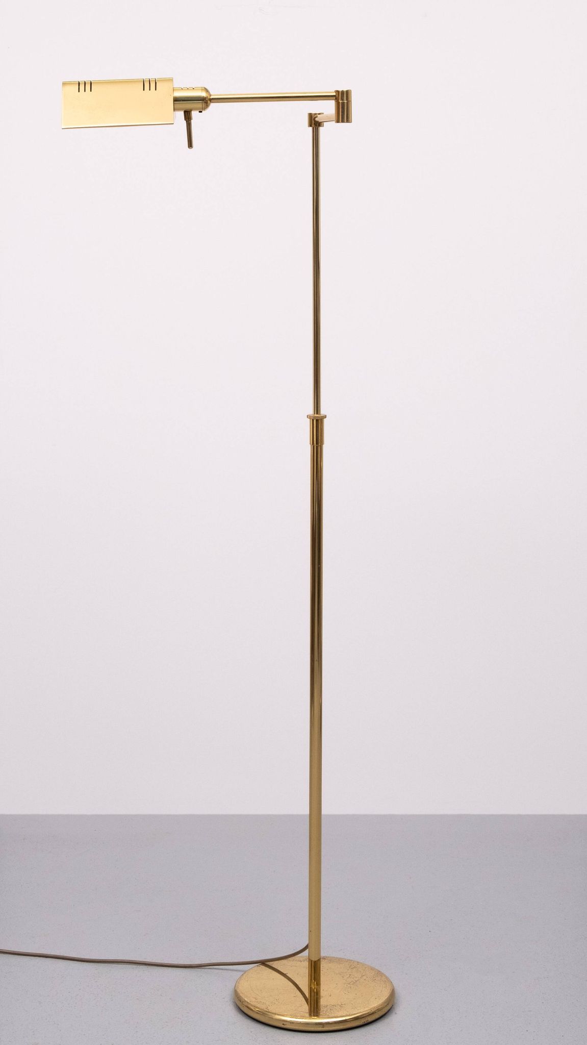 Holtkoetter adjustable Brass swing arm floor lamp. Germany