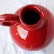Red ceramic pitcher